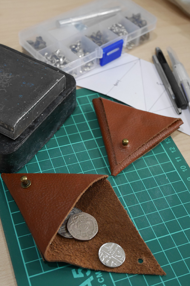 Triangle leather pouch